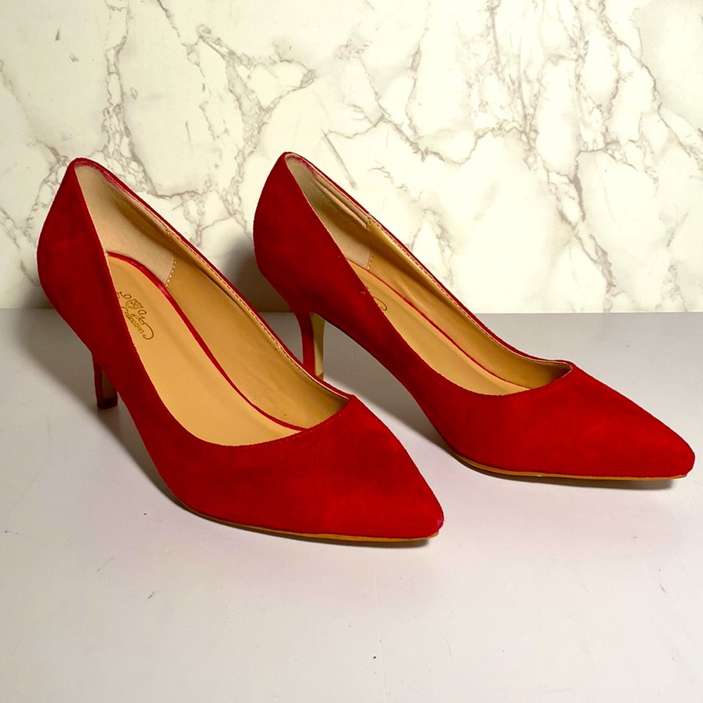 New red suede pumps. Brand new.